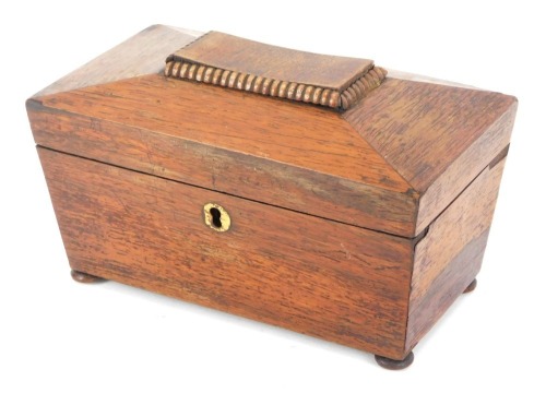 Appraisal: A Regency rosewood tea caddy of sarcophagus form twin canisters