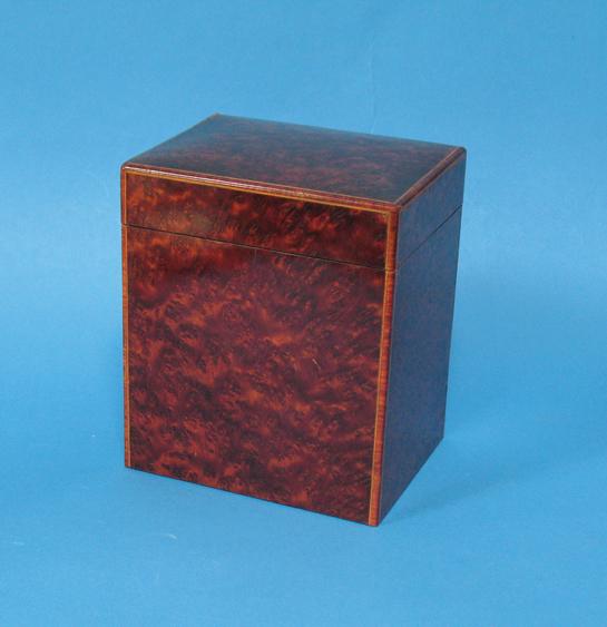 Appraisal: AN AMBOYNA VENEERED TEA CADDY of rectangular form with a