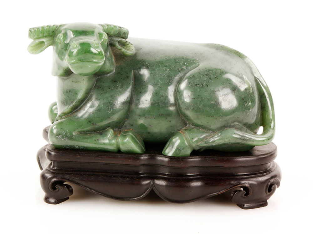 Appraisal: - Chinese Carved Green Jade Ox Carved green jade figure