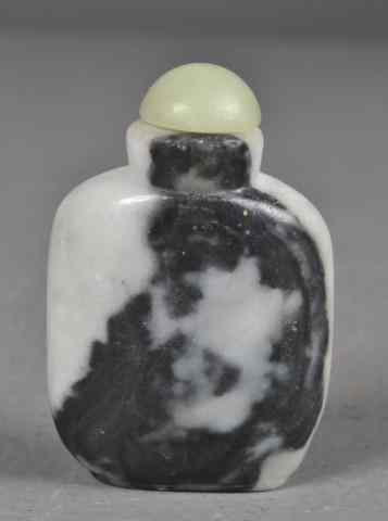 Appraisal: Chinese Carved Hardstone Snuff BottleFinely carved the stone a white