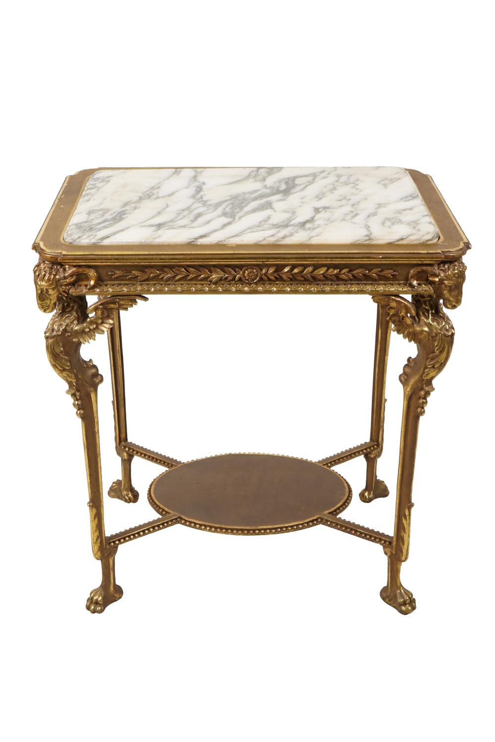 Appraisal: NEOCLASSICAL STYLE MARBLE-TOP GILT WOOD TABLEmodern with ram's head decoration