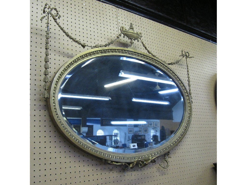 Appraisal: Gilt framed wall mirror decorated with urn and swags some