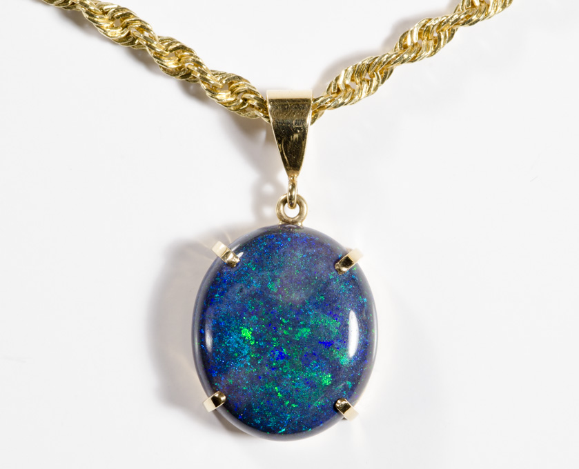 Appraisal: AUSTRALIAN ANDAMOOKA BLACK OPAL AND FOURTEEN KARAT GOLD PENDANT NECKLACE