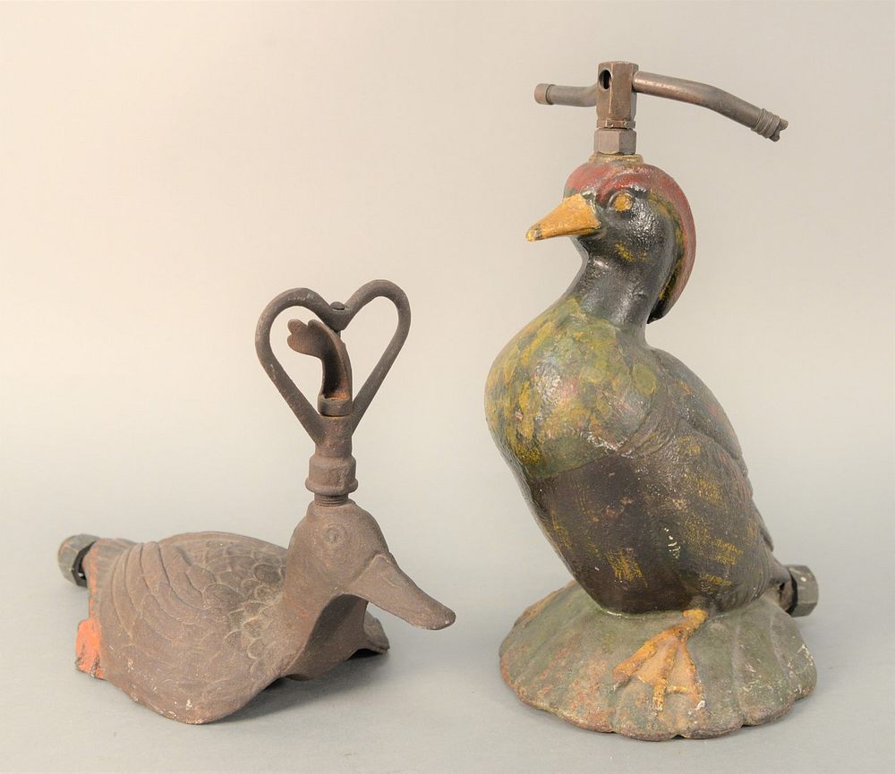 Appraisal: Two Cast Iron Lawn Sprinklers wood duck with original paint