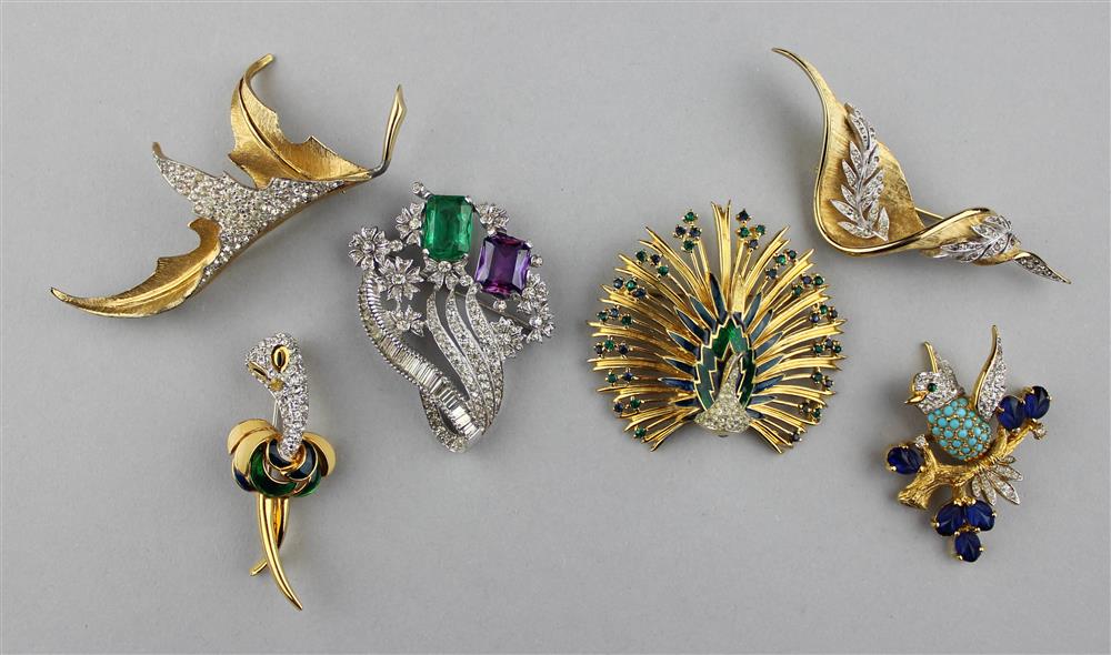 Appraisal: A COLLECTION OF SIX JOMAZ BROOCHES peacock two leaf brooches