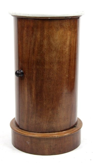 Appraisal: A Victorian mahogany cylindrical bedside cupboard with marble top cm