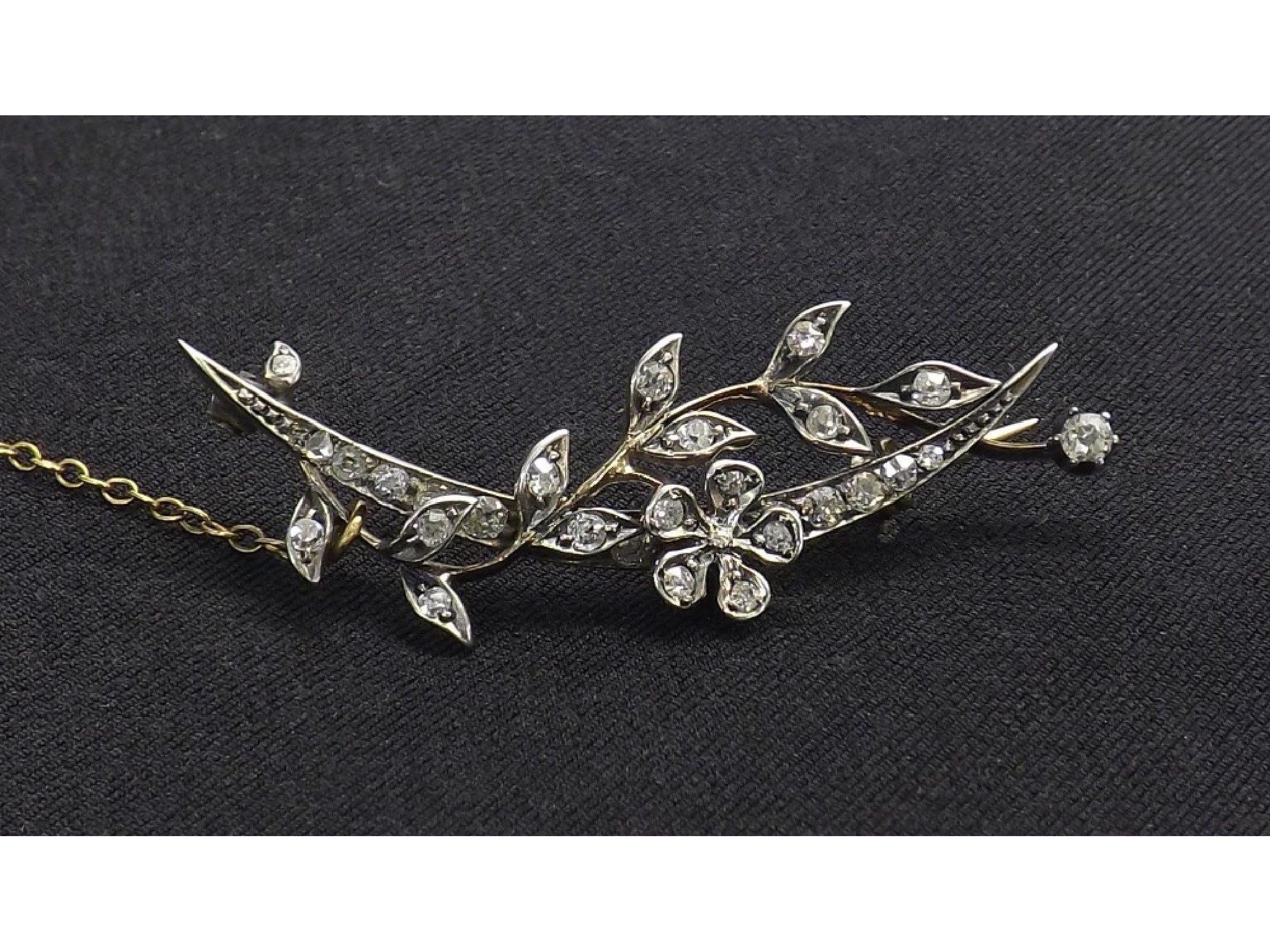 Appraisal: Attractive diamond set floral brooch with old-cut diamonds with safety