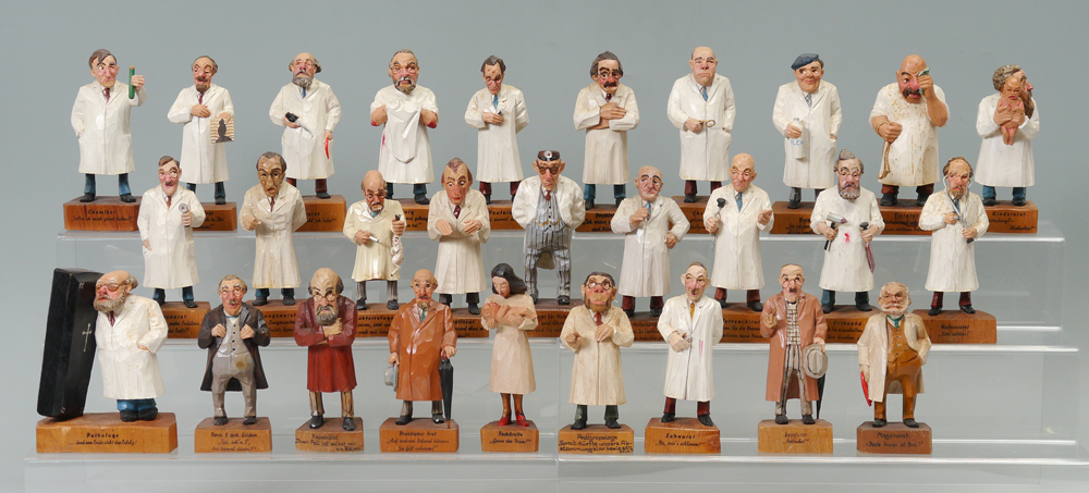 Appraisal: PRETZL CARVED WOOD FIGURES Collection of assorted professions most appear