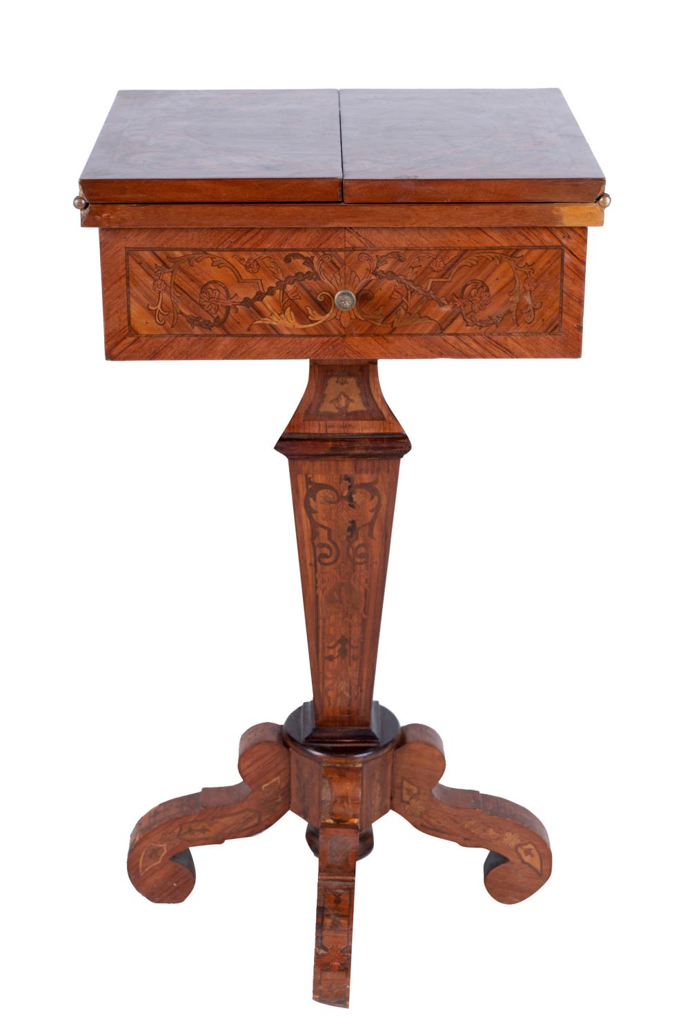 Appraisal: MARQUETRY PEDESTAL GAMES TABLEthe hinged top unfolding to an inlaid