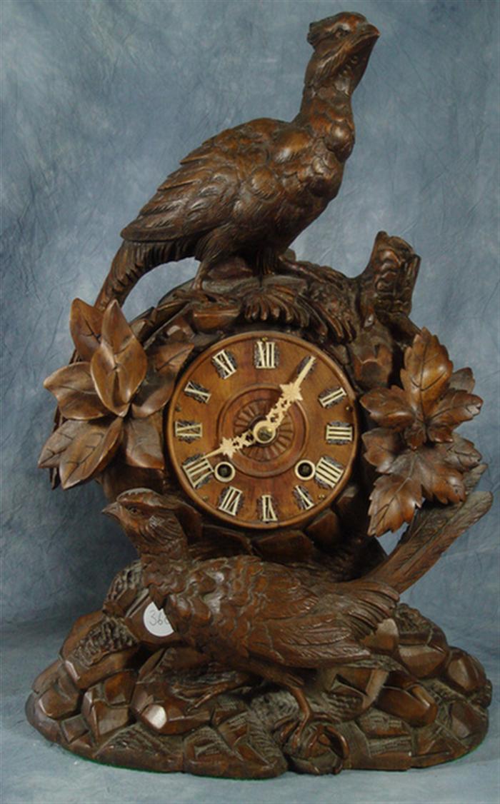 Appraisal: Figural carved Black Forest mantle clock birds perched on rocky