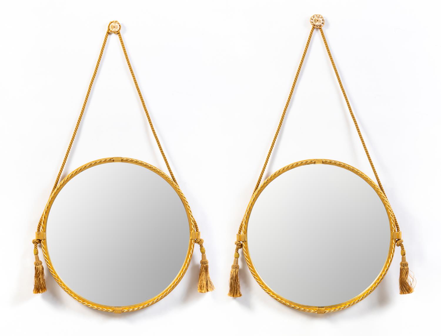 Appraisal: PAIR CIRCULAR GILT METAL MIRRORS WITH TWIST TRIM Possibly American