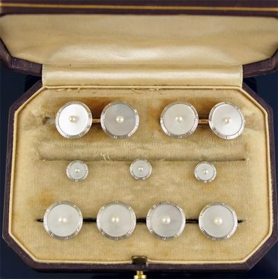 Appraisal: A set of dress cuff links and studs the circular