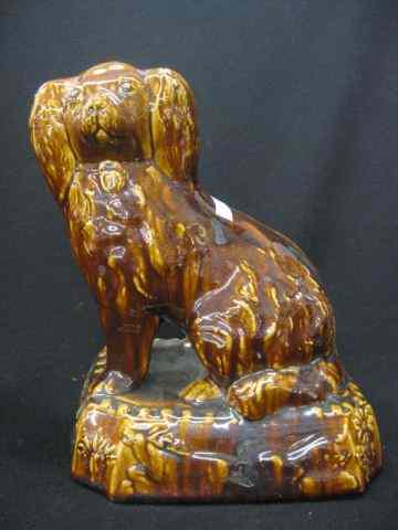 Appraisal: Rockingham or Bennington Pottery DogFigurine spaniel seated '' tall stag