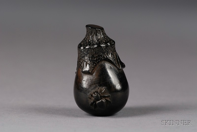 Appraisal: Hardwood Netsuke th century study of an insect-eaten eggplant with