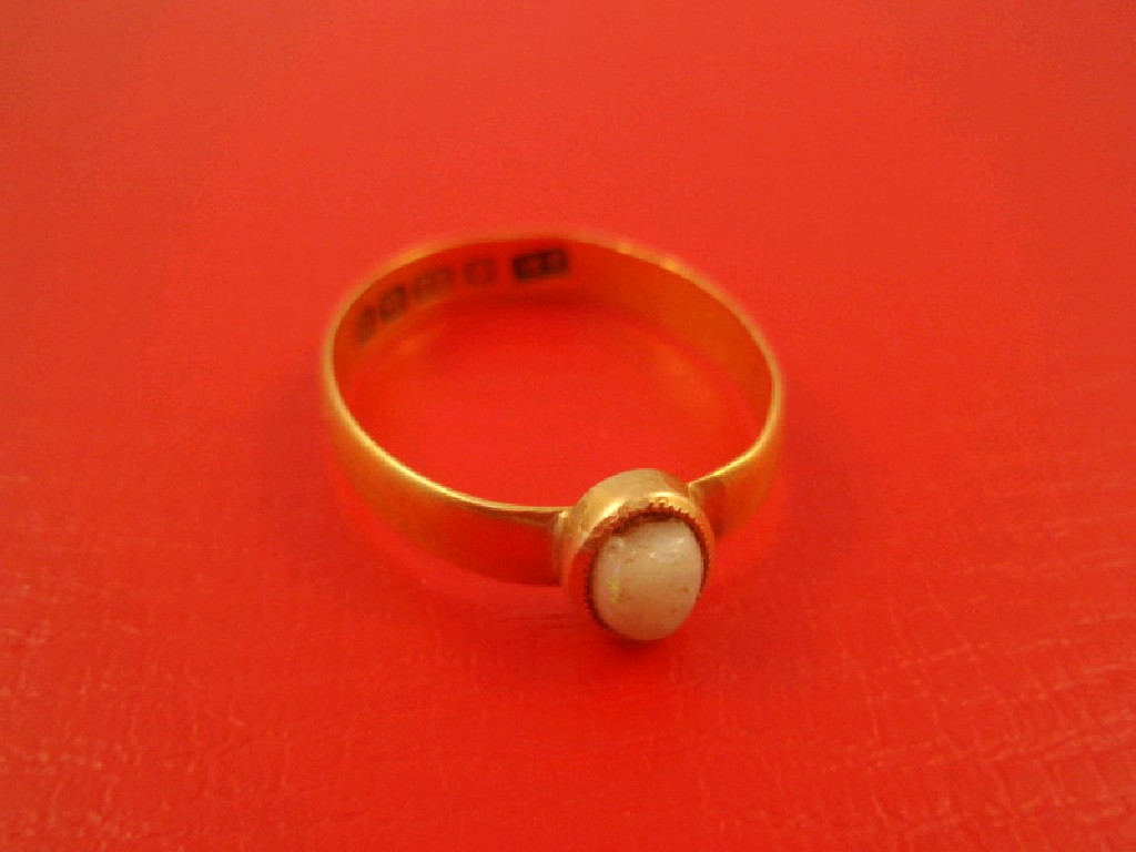 Appraisal: A ct gold band Birmingham assay with later attached opal