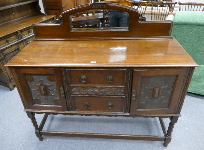 Appraisal: Edwardian carved oak and beaded sideboard on stretcher base with