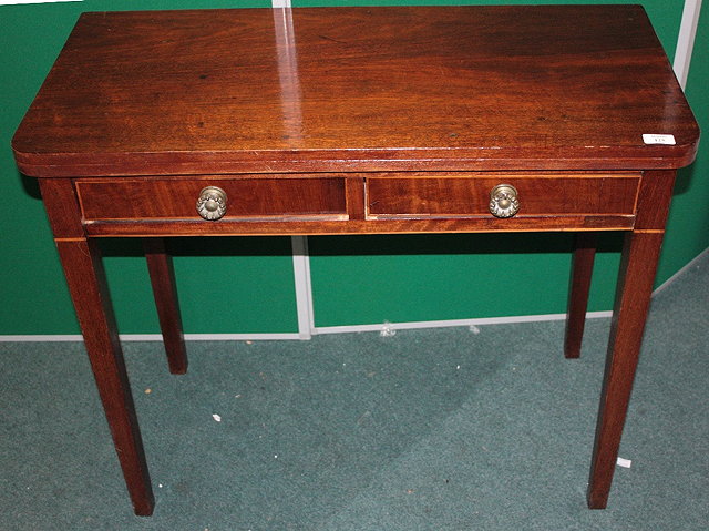 Appraisal: A TH CENTURY MAHOGANY FOLD-OVER TEA TABLE cm