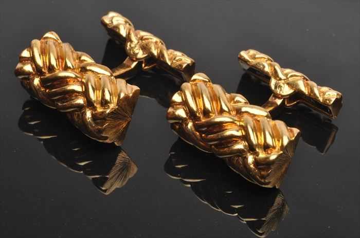 Appraisal: THREE PAIRS OF CUFFLINKS The gold braid stamped k in