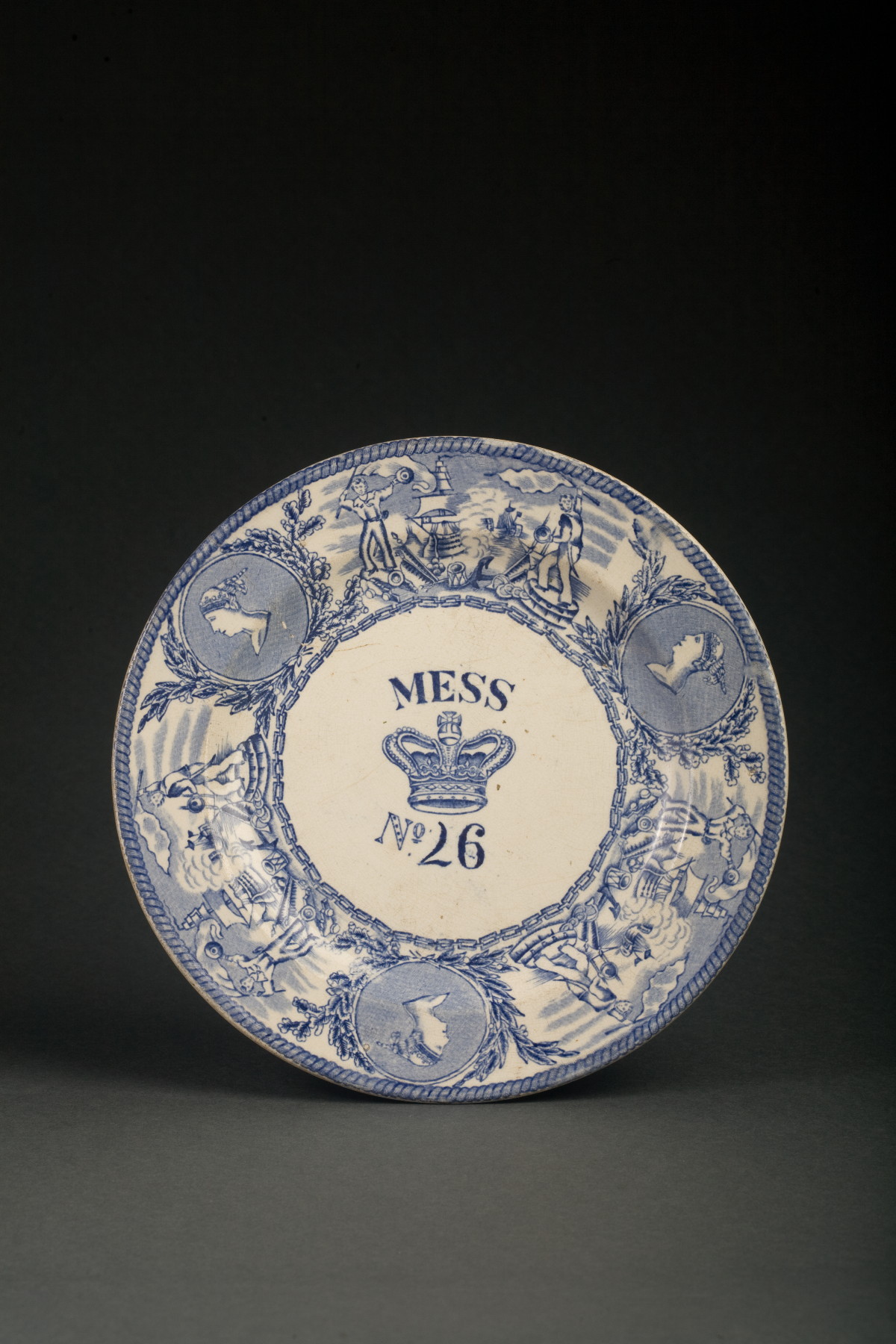 Appraisal: ENGLISH IRONSTONE BLUE TRANSFER-PRINTED MESS PLATE Printed in the center