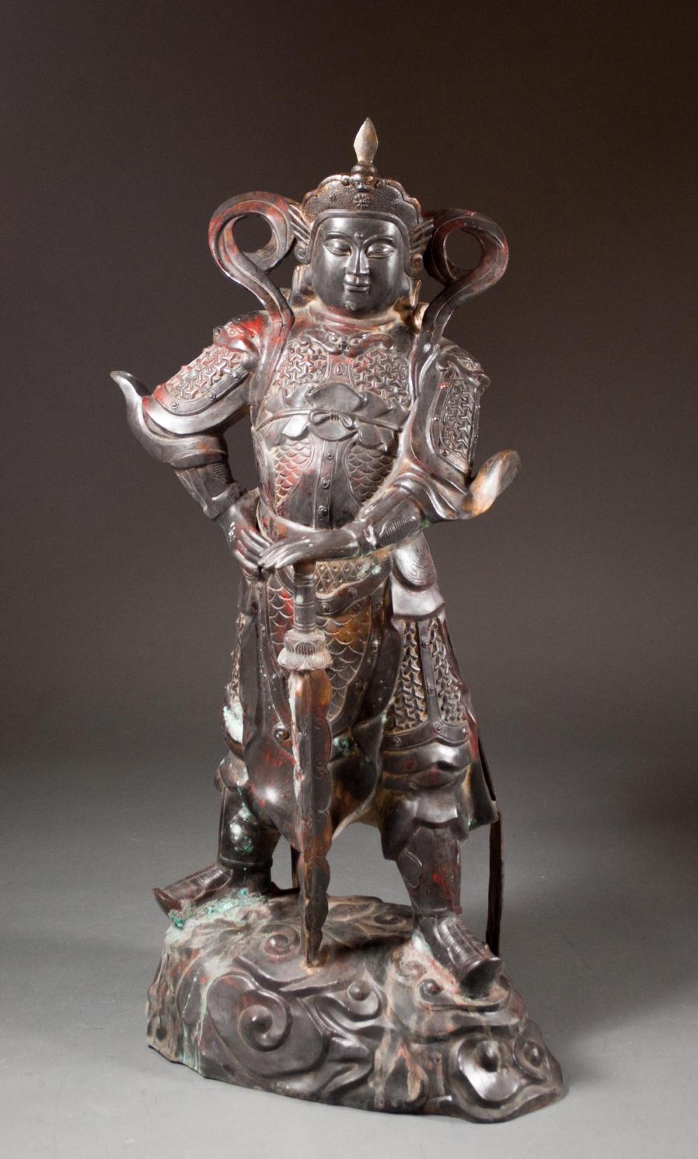 Appraisal: CHINESE PATINATED BRONZE IMMORTAL WARRIOR FLOOR FIGURE in standing pose