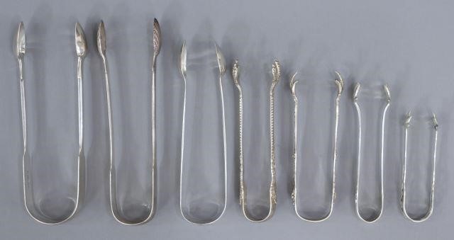 Appraisal: lot of Sterling silver sugar tongs including English George IV