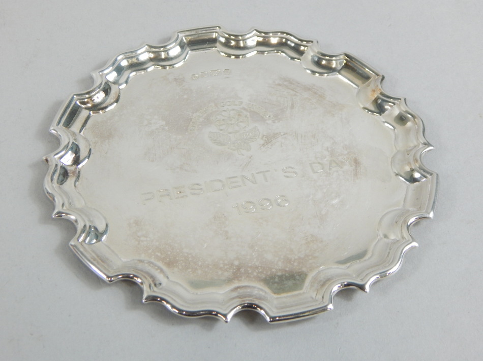 Appraisal: A silver small salver with pie crust border engraved English