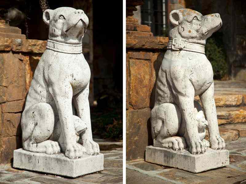 Appraisal: Two Italian Cast Stone Statues of Sitting Dogsearly th century