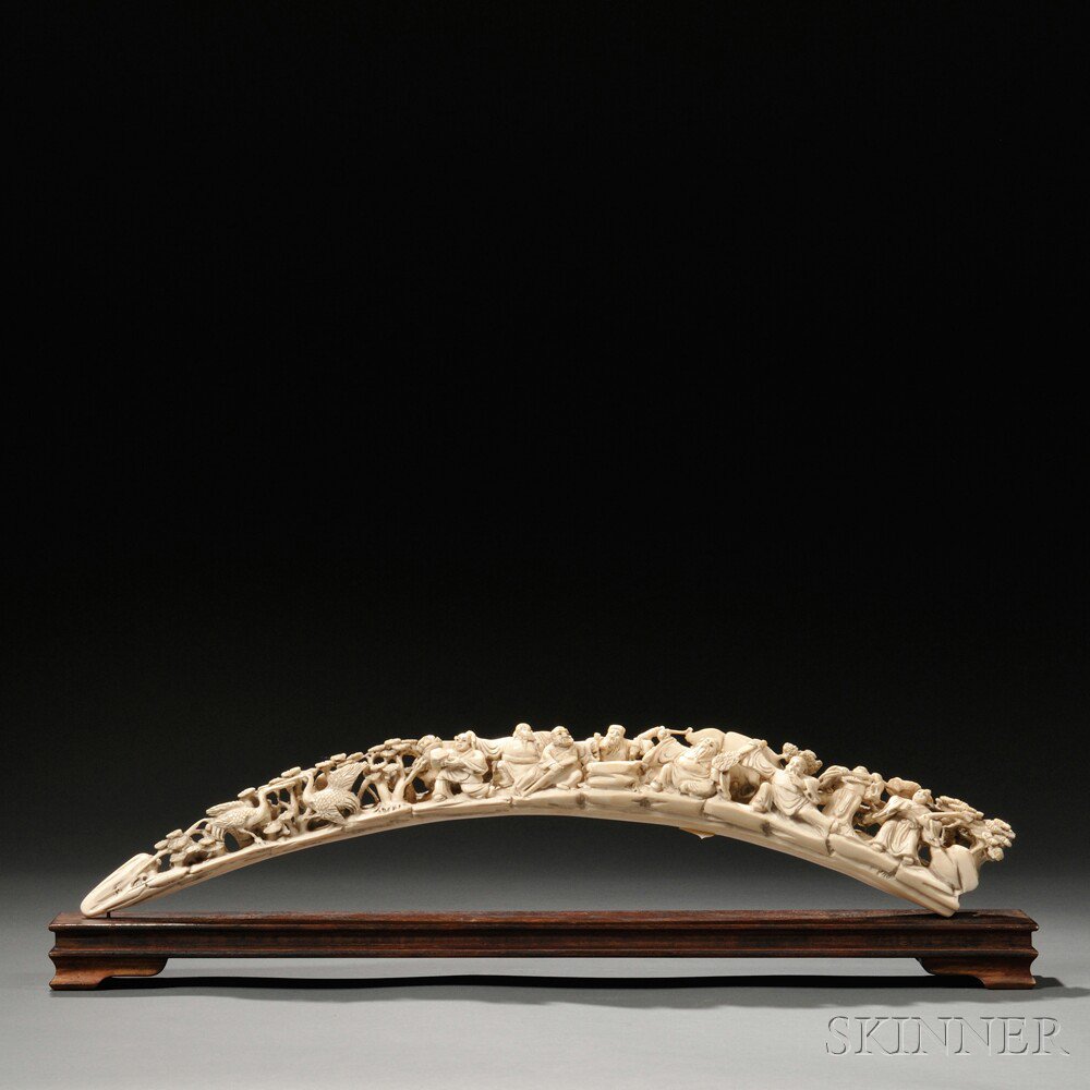 Appraisal: Ivory Tusk China carved with the eight Daoist Immortals and