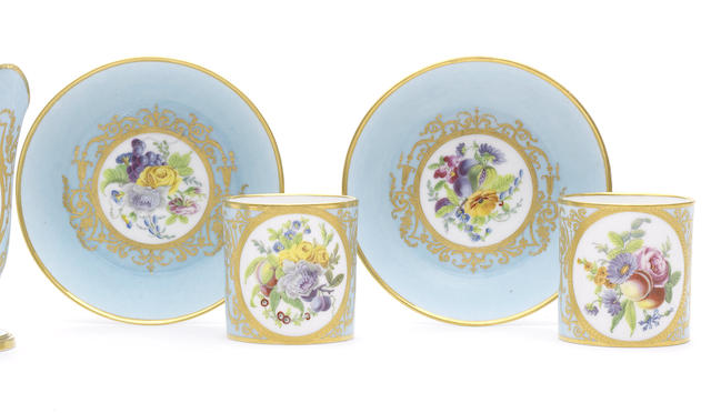 Appraisal: A pair of S vres pale-blue-ground cups and saucers circa