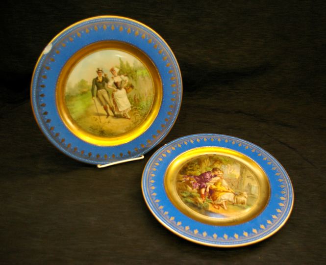 Appraisal: Pair of Richly Gilded Periwinkle Blue-Bordered Vienna Porcelain Cabinet Plates