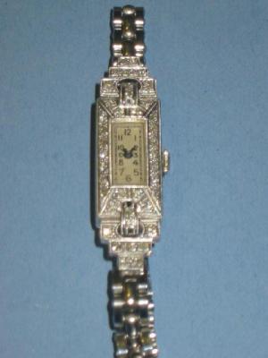 Appraisal: A LADY'S ART DECO COCKTAIL WATCH the rectangular platinum case