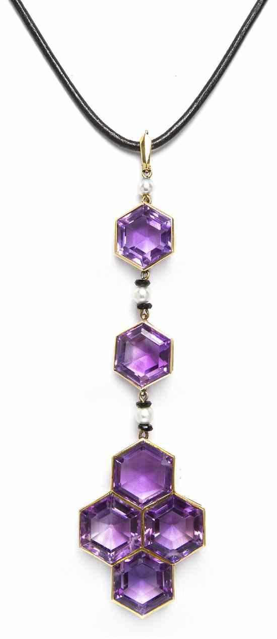 Appraisal: A Yellow Gold Amethyst and Cultured Pearl Pendant containing six