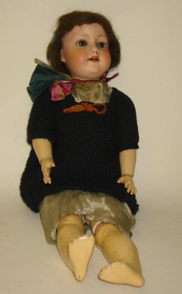 Appraisal: An Armand Marseille bisque head girl doll with blue glass