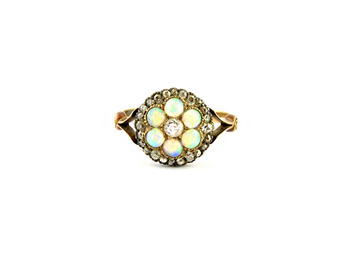 Appraisal: A gold opal and diamond set cluster ring mounted with