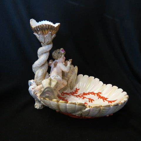 Appraisal: th Century Figural Porcelain Dish shells cherub dolphins tall