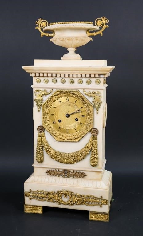 Appraisal: French alabaster and gilt metal clock Gilt garlands and cornucopias