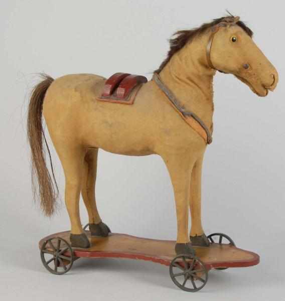 Appraisal: Horse on Platform Toy Description German Platform is wood and