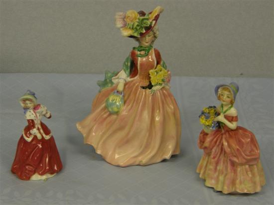 Appraisal: Three Royal Doulton figures 'Honey' HN Cisse HN and Christmass