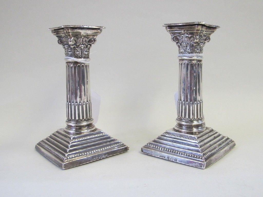 Appraisal: Pair of Corinthian column silver candl