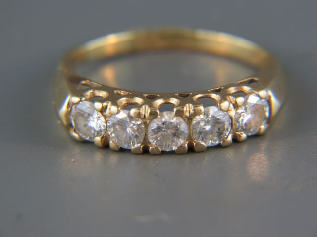 Appraisal: Diamond Band five diamonds totaling carat in k yellow gold