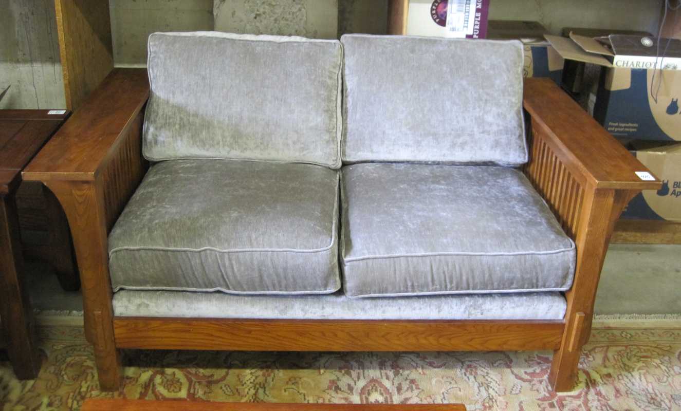 Appraisal: AMERICAN CRAFTSMAN STYLE OAK LOVESEAT recent production having a two-cushion