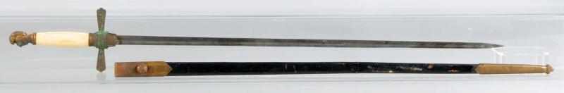 Appraisal: Knights Head Sword w Scabbard Description Handle has a knights