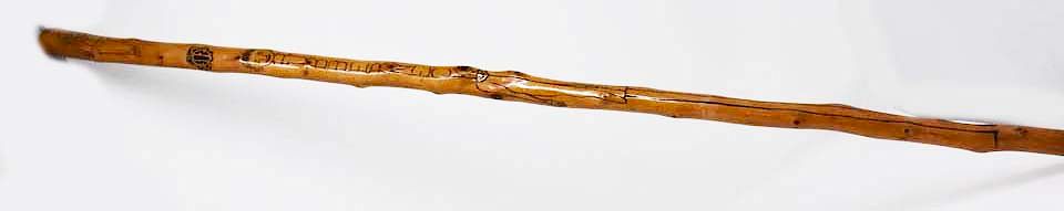 Appraisal: Walking stick Walking stick with simple carving of a man