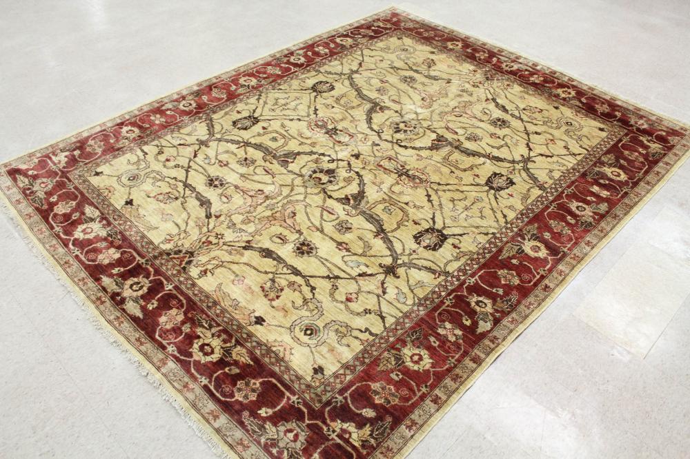 Appraisal: HAND KNOTTED ORIENTAL CARPET Indo-Persian overall scrolling floral arabesque design