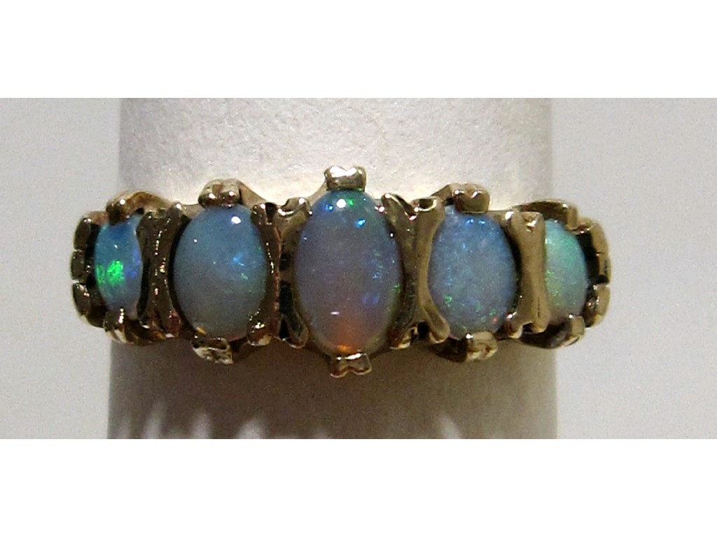 Appraisal: Nine carat gold opal five stone ring