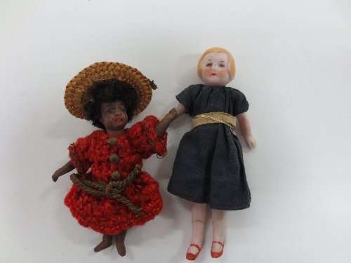 Appraisal: A bisque doll with moulded hair jointed limbs and painted