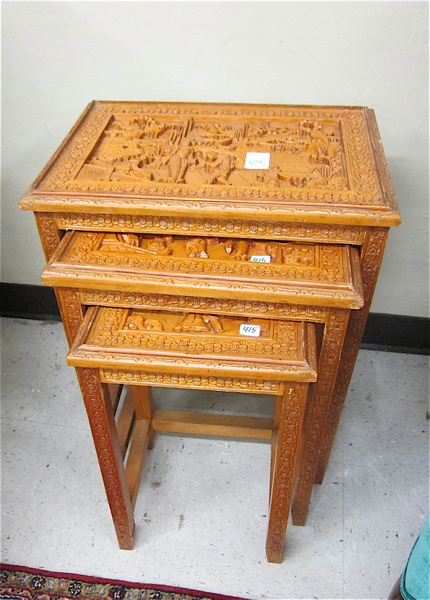 Appraisal: A NESTING SET OF THREE CARVED OCCASIONAL TABLES Chinese th