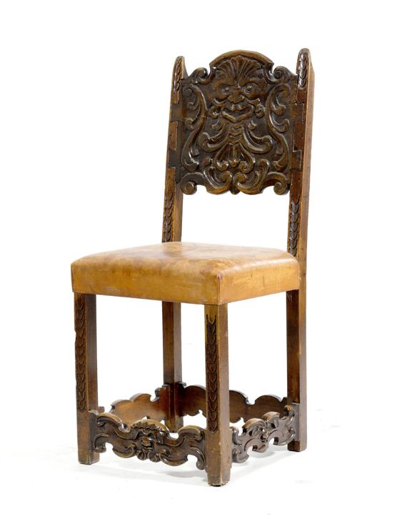 Appraisal: CHAIR Baroque Switzerland th c Carved walnut Brown leather covers