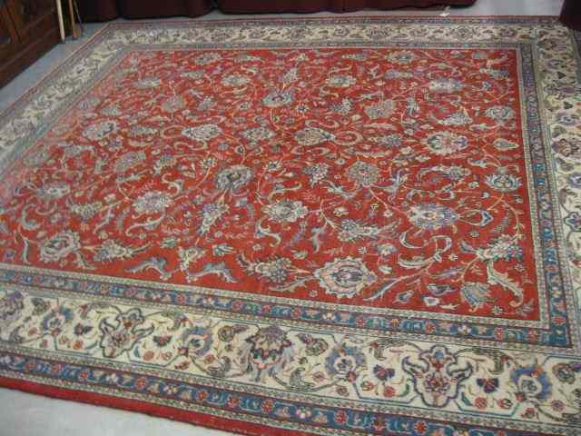 Appraisal: Tabriz Persian Handmade Rug elaboratefloral red field ' '' x