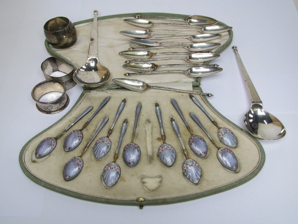 Appraisal: A lot comprising a part set silver and enamel spoons